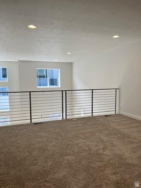 6850 S Static Peak Dr Unit 261, West Jordan, UT 84081 - carpeted spare room with baseboards and recessed lighting