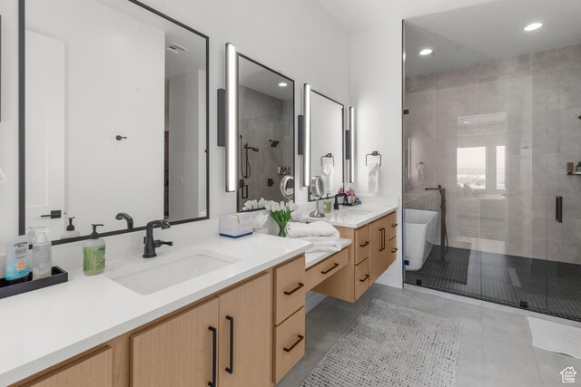 1248 S Seminole Way, Washington, UT 84780 - bathroom featuring vanity, a shower stall, a soaking tub, tile patterned floors, and recessed lighting