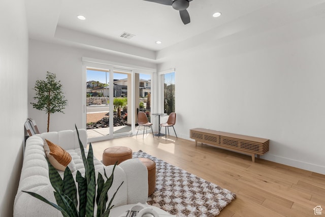 1248 S Seminole Way, Washington, UT 84780 - living area featuring a ceiling fan, a tray ceiling, baseboards, wood finished floors, and recessed lighting