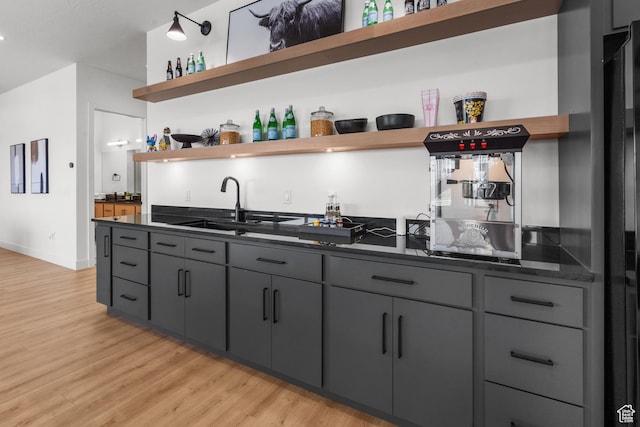 1248 S Seminole Way, Washington, UT 84780 - indoor wet bar with light wood finished floors and baseboards
