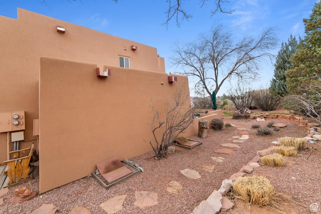 3245 E Fairway Loop, Moab, UT 84532 - view of side of property featuring stucco siding