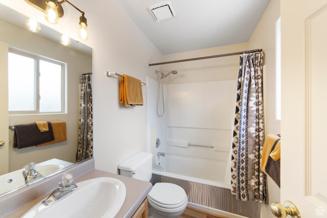 3245 E Fairway Loop, Moab, UT 84532 - bathroom with toilet, vanity, shower / tub combo with curtain, and visible vents