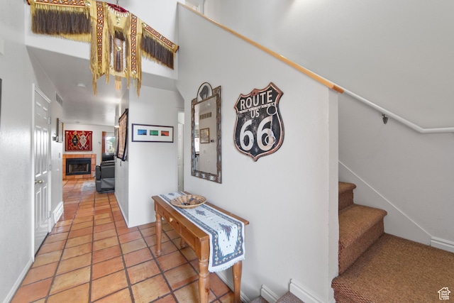 3245 E Fairway Loop, Moab, UT 84532 - hall with light tile patterned floors, visible vents, and stairway