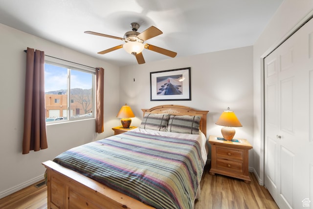 3245 E Fairway Loop, Moab, UT 84532 - bedroom featuring a closet, light wood finished floors, baseboards, and visible vents