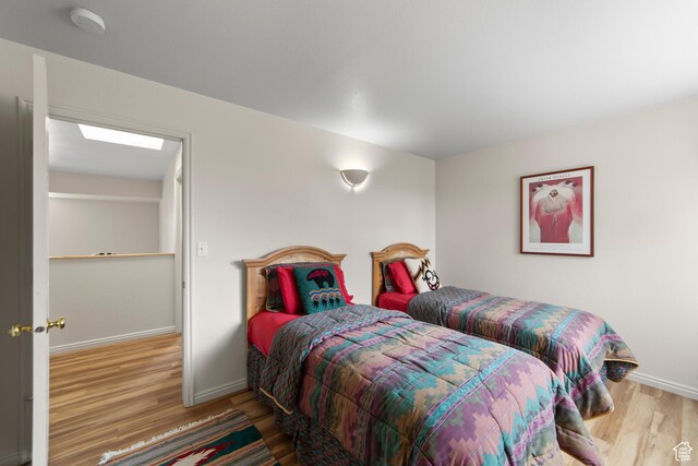 3245 E Fairway Loop, Moab, UT 84532 - bedroom featuring baseboards and wood finished floors