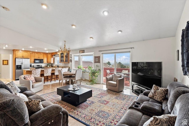 6958 S Sunrise Hills Cir E, Cottonwood Heights, UT 84121 - living area with recessed lighting, a notable chandelier, and lofted ceiling