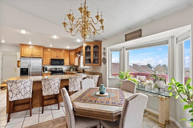 6958 S Sunrise Hills Cir E, Cottonwood Heights, UT 84121 - dining area with a healthy amount of sunlight, recessed lighting, light tile patterned floors, and an inviting chandelier