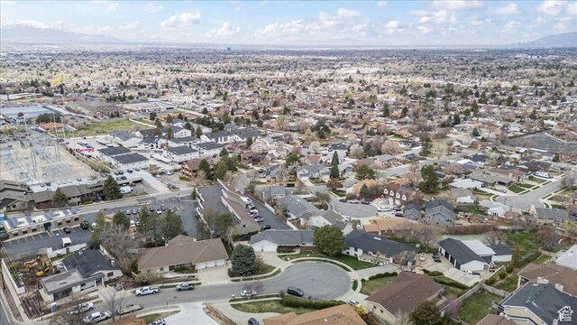 6958 S Sunrise Hills Cir E, Cottonwood Heights, UT 84121 - birds eye view of property featuring a mountain view and a residential view