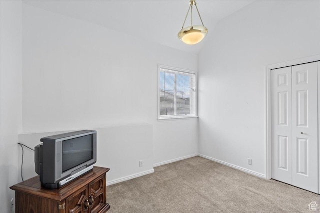 6958 S Sunrise Hills Cir E, Cottonwood Heights, UT 84121 - unfurnished bedroom featuring a closet, vaulted ceiling, carpet, and baseboards