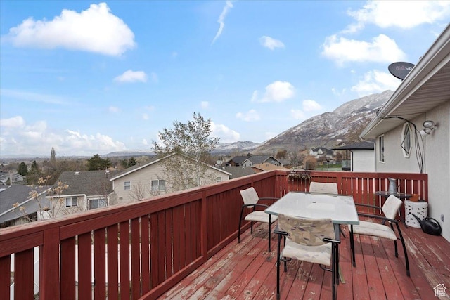 6958 S Sunrise Hills Cir E, Cottonwood Heights, UT 84121 - deck with a residential view, a mountain view, and outdoor dining area