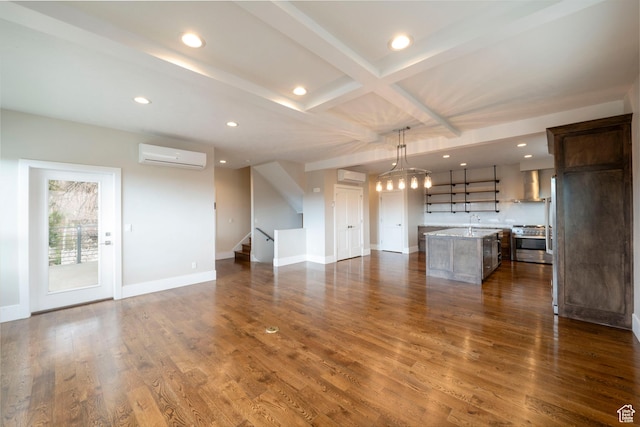 51 S 800 E, Salt Lake City, UT 84102 - unfurnished living room featuring recessed lighting, an AC wall unit, baseboards, and dark wood-type flooring