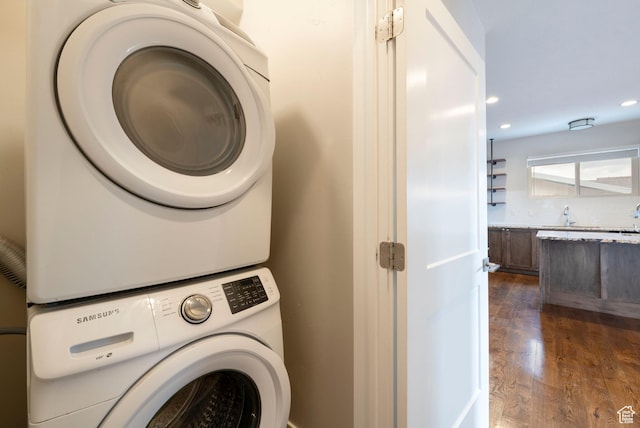 51 S 800 E, Salt Lake City, UT 84102 - laundry area with dark wood-style floors, recessed lighting, stacked washer / drying machine, and laundry area