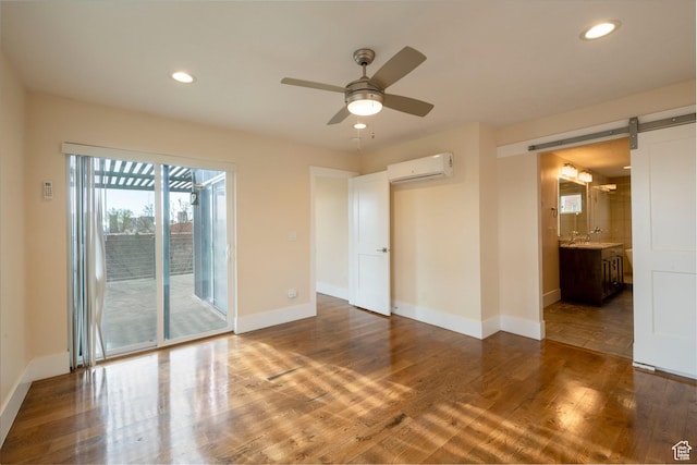 51 S 800 E, Salt Lake City, UT 84102 - spare room featuring recessed lighting, baseboards, a ceiling fan, a wall mounted air conditioner, and wood finished floors