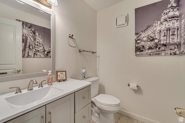5518 S 875 E, South Ogden, UT 84405 - bathroom with tile patterned floors, vanity, toilet, and baseboards