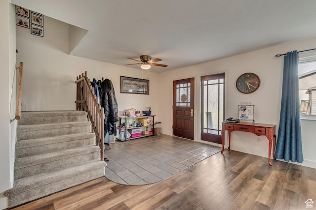 5518 S 875 E, South Ogden, UT 84405 - foyer entrance with stairs, wood finished floors, and a healthy amount of sunlight