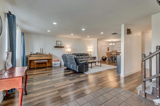 5518 S 875 E, South Ogden, UT 84405 - living room featuring stairs, recessed lighting, baseboards, a notable chandelier, and wood finished floors