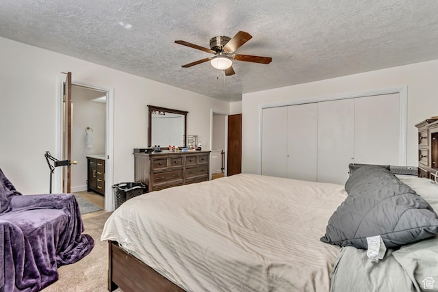 5518 S 875 E, South Ogden, UT 84405 - bedroom with light colored carpet, a textured ceiling, ensuite bath, ceiling fan, and a closet