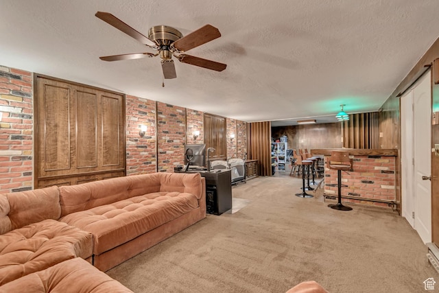 5518 S 875 E, South Ogden, UT 84405 - living room with a textured ceiling, brick wall, light colored carpet, and ceiling fan