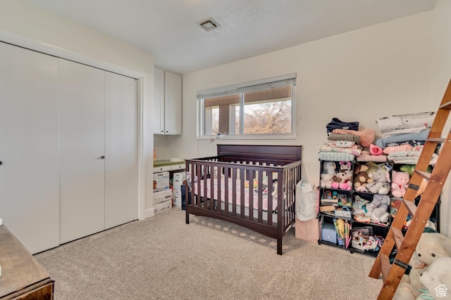 5518 S 875 E, South Ogden, UT 84405 - carpeted bedroom featuring visible vents and a closet