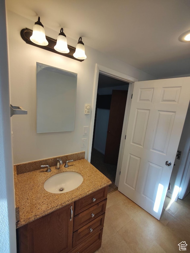 124 N Lakeview Dr, Manila, UT 84046 - bathroom with vanity and tile patterned flooring
