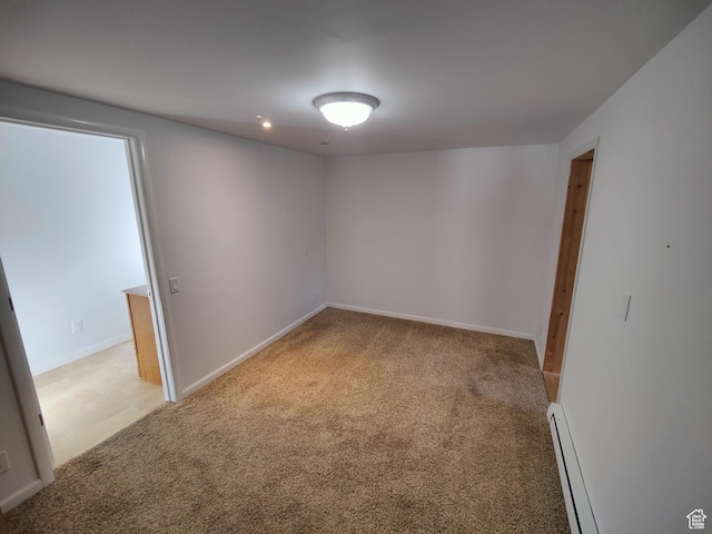 124 N Lakeview Dr, Manila, UT 84046 - spare room with light colored carpet, recessed lighting, baseboards, and baseboard heating
