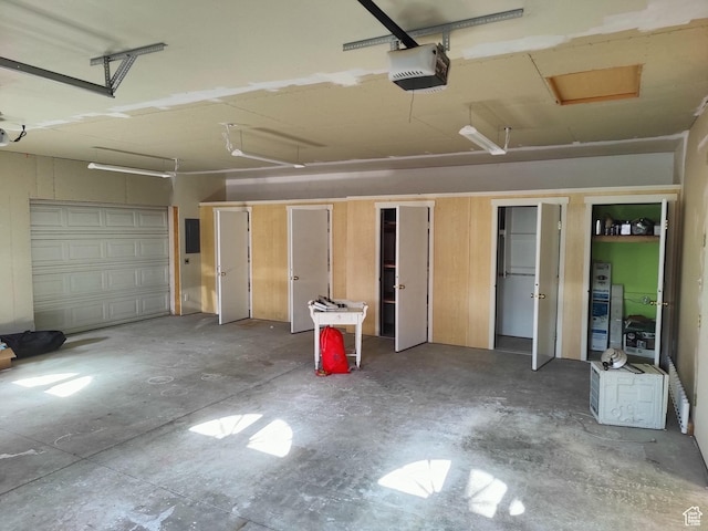 124 N Lakeview Dr, Manila, UT 84046 - garage featuring a garage door opener and electric panel