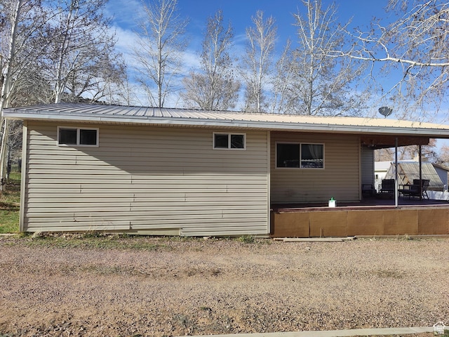 124 N Lakeview Dr, Manila, UT 84046 - back of property featuring a patio and metal roof