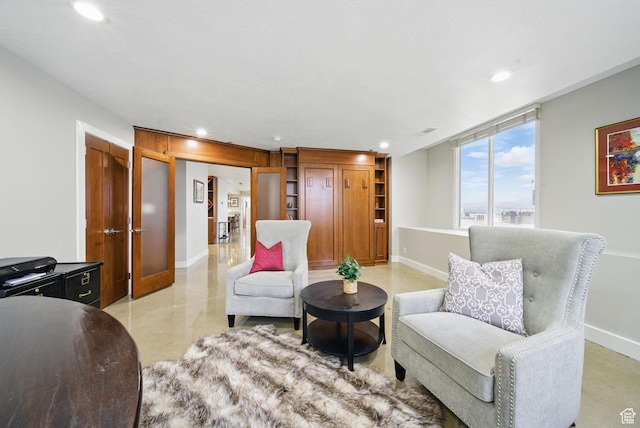 44 W Broadway Unit 605S, Salt Lake City, UT 84101 - sitting room with visible vents, baseboards, concrete floors, and recessed lighting