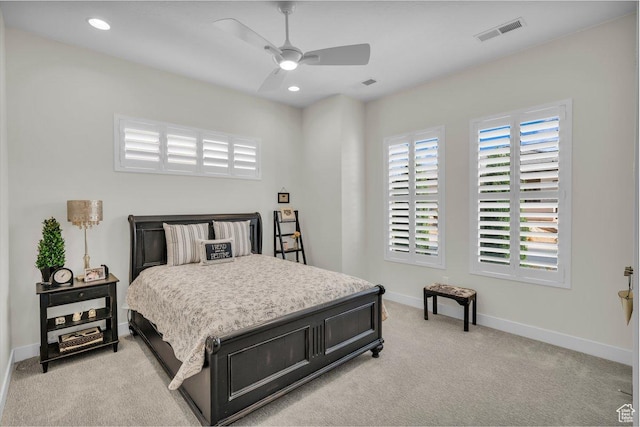 bedroom featuring recessed lighting, baseboards, visible vents, a ceiling fan, and light carpet