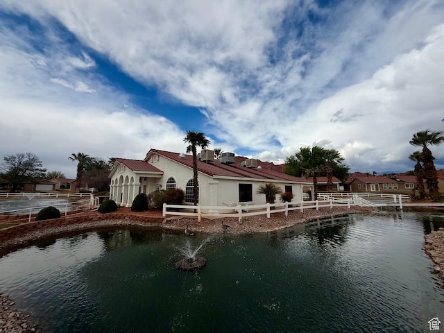 544 S Fiesta Dr, Ivins, UT 84738 - rear view of house featuring stucco siding and fence
