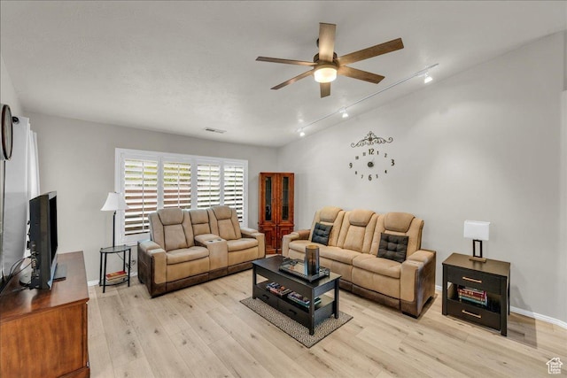 544 S Fiesta Dr, Ivins, UT 84738 - living room with light wood-style flooring, baseboards, visible vents, a ceiling fan, and track lighting