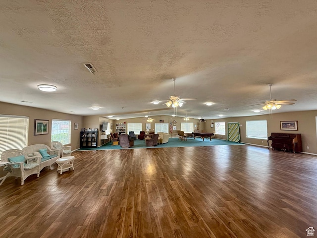 544 S Fiesta Dr, Ivins, UT 84738 - misc room featuring a textured ceiling, wood finished floors, and a ceiling fan