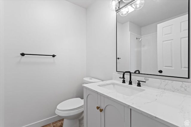 4489 W Black Elk Way, West Jordan, UT 84088 - bathroom with baseboards, toilet, and vanity