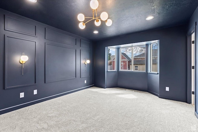 4489 W Black Elk Way, West Jordan, UT 84088 - carpeted empty room featuring a textured ceiling and a chandelier
