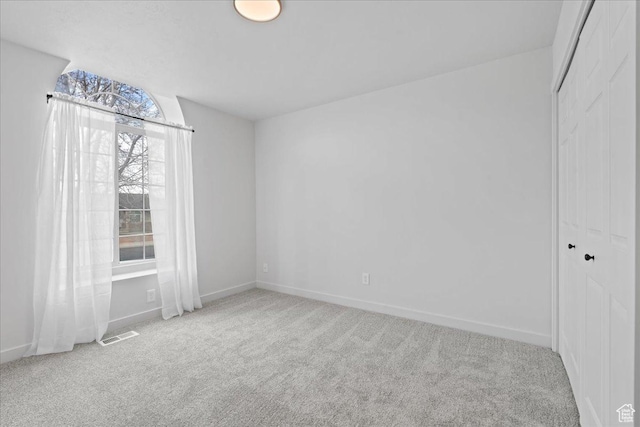 4489 W Black Elk Way, West Jordan, UT 84088 - carpeted spare room featuring baseboards and visible vents