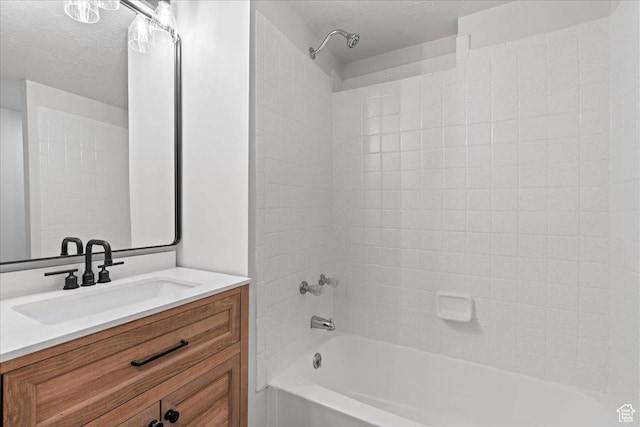 4489 W Black Elk Way, West Jordan, UT 84088 - full bath with a textured ceiling, bathing tub / shower combination, and vanity