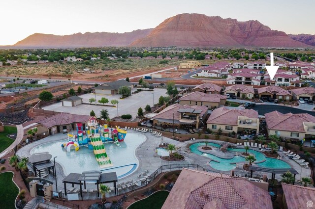 3823 W Dream Cir Unit 120, Santa Clara, UT 84765 - drone / aerial view with a mountain view and a residential view