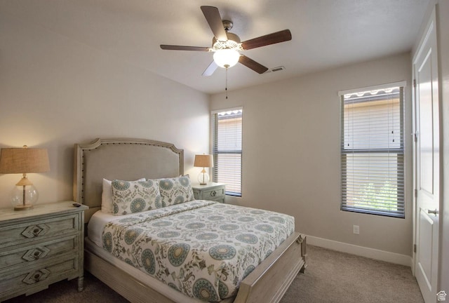 3823 W Dream Cir Unit 120, Santa Clara, UT 84765 - carpeted bedroom with a ceiling fan, baseboards, and visible vents