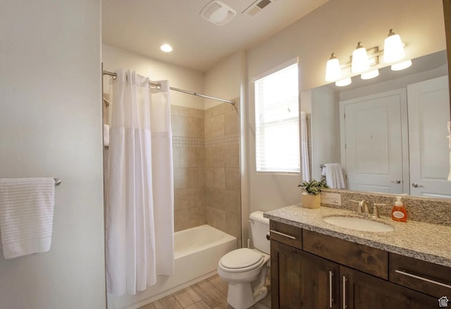 3823 W Dream Cir Unit 120, Santa Clara, UT 84765 - full bath with toilet, shower / tub combo with curtain, vanity, wood finished floors, and visible vents