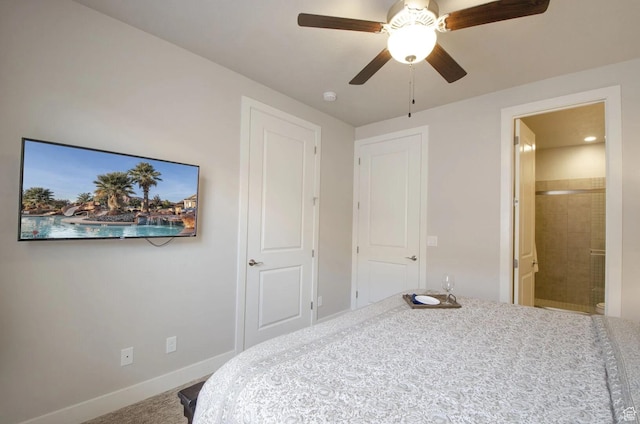 3823 W Dream Cir Unit 120, Santa Clara, UT 84765 - bedroom featuring connected bathroom, baseboards, and a ceiling fan