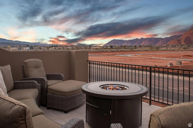 3823 W Dream Cir Unit 120, Santa Clara, UT 84765 - patio terrace at dusk featuring a balcony and a mountain view