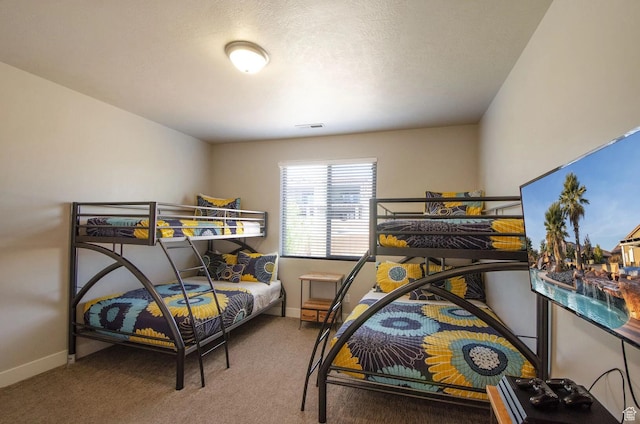 3823 W Dream Cir Unit 120, Santa Clara, UT 84765 - bedroom featuring baseboards, carpet floors, and visible vents