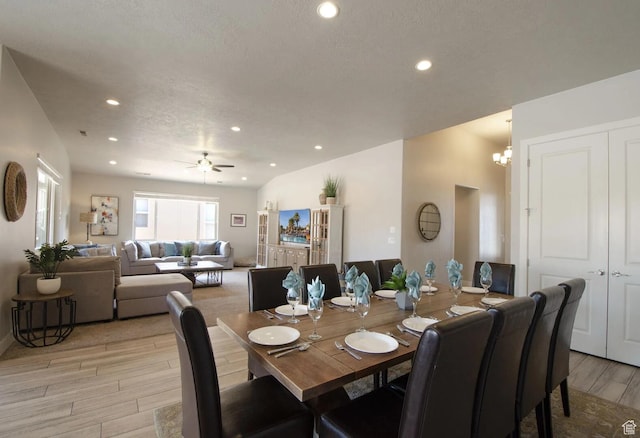 3823 W Dream Cir Unit 120, Santa Clara, UT 84765 - dining area with light wood finished floors, ceiling fan with notable chandelier, recessed lighting, and a textured ceiling