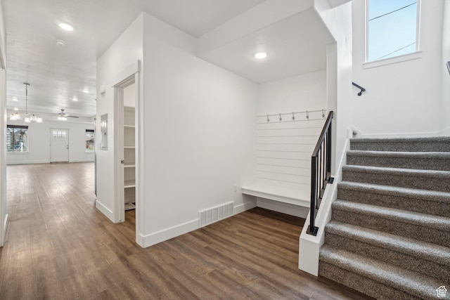 interior space featuring wood finished floors, baseboards, visible vents, and recessed lighting
