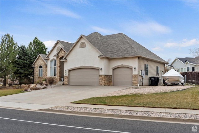 french country inspired facade with stucco siding, an attached garage, stone siding, driveway, and a front yard