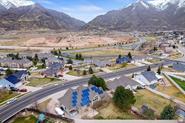 aerial view with a mountain view and a residential view