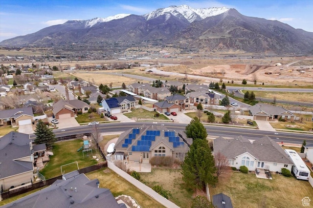 birds eye view of property with a residential view and a mountain view