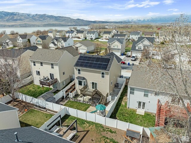 drone / aerial view featuring a mountain view and a residential view