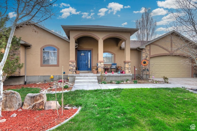 1288 S Pondside Dr, Saratoga Springs, UT 84045 - view of front of house featuring a garage, concrete driveway, a front lawn, stucco siding, and a porch