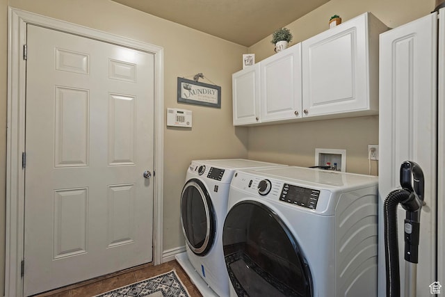 1288 S Pondside Dr, Saratoga Springs, UT 84045 - clothes washing area with washing machine and clothes dryer, cabinet space, and tile patterned floors